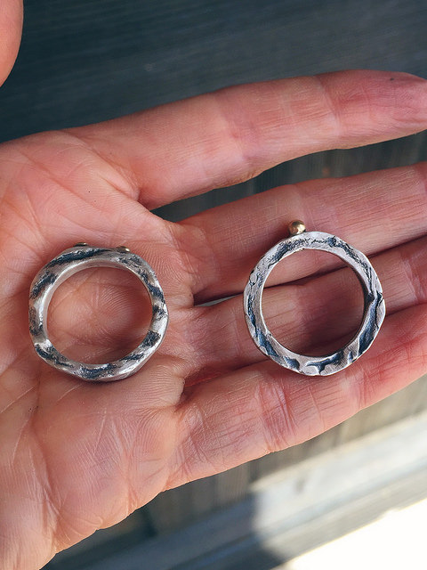 two hand forged silver with gold rings
