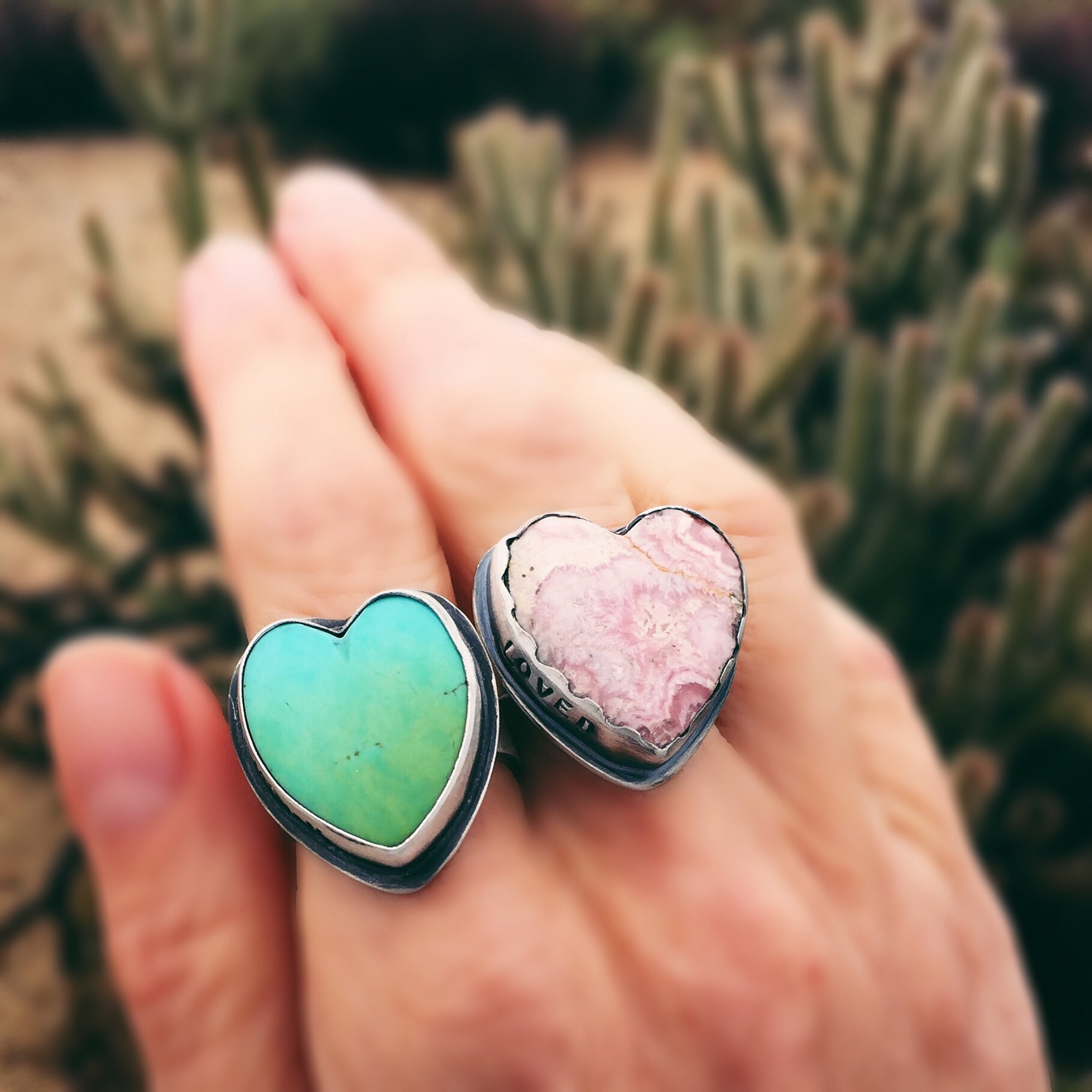 Kingman turquoise and Rhodochrosite heart rings by Sisters of the Sun®.