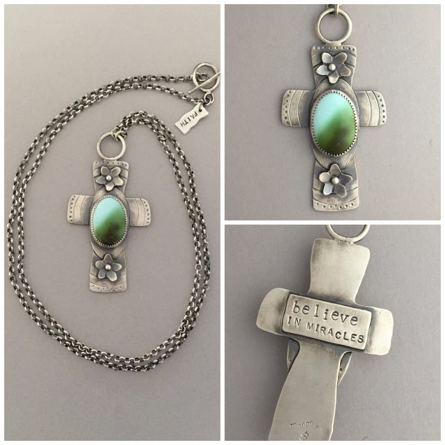 Silver cross with turquoise